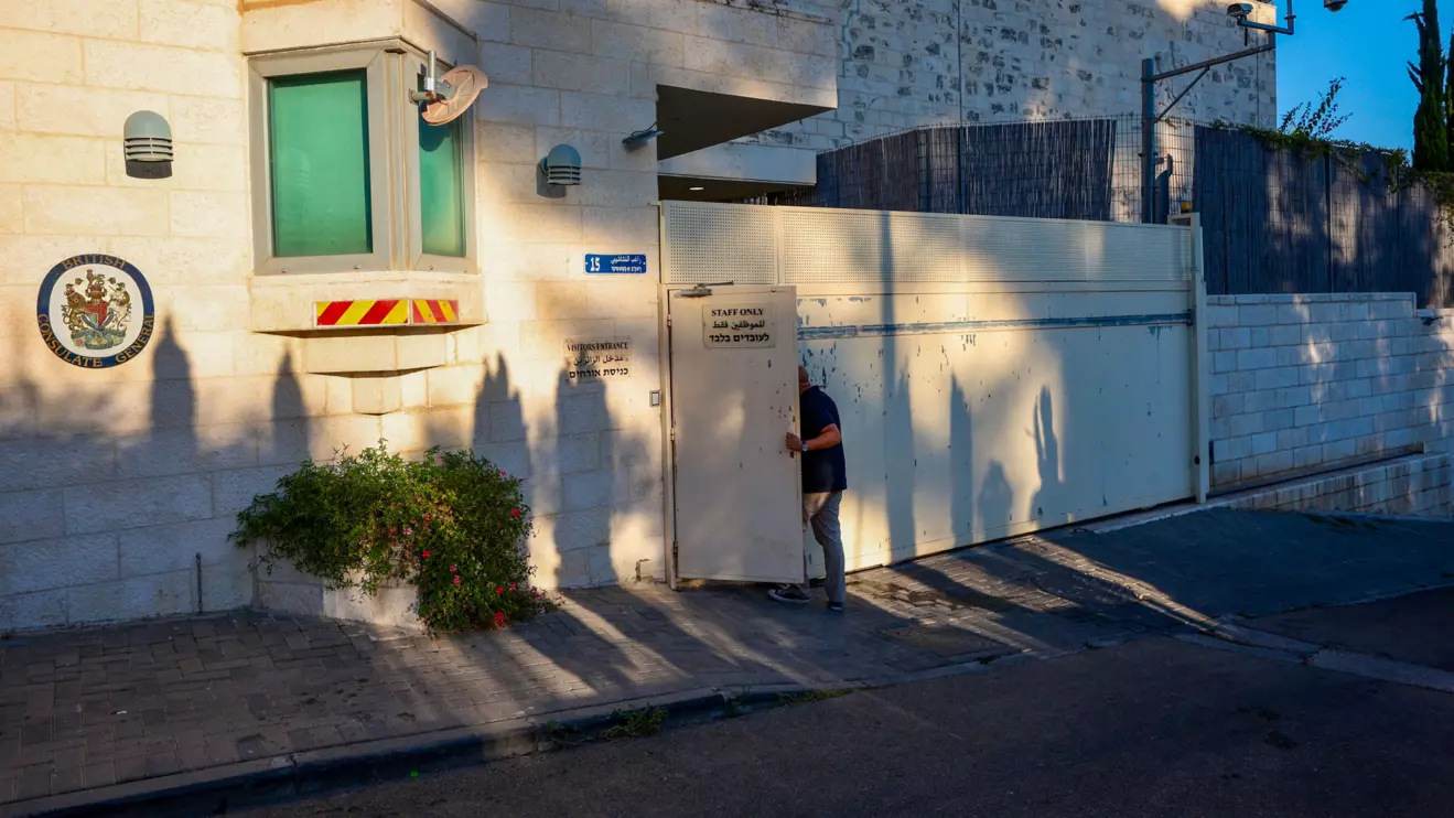 A person enters the British Consulate, on the day Israeli Foreign Minister Gideon Saar said he would close it in response to trade sanctions imposed by British Prime Minister Andy Burnham against Israeli settlements in the occupied West Bank, in Jerusalem, September 8, 2026. Reuters/Jamal Awad