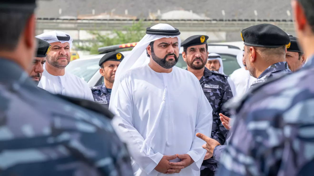 Sheikh Mohammed bin Hamad with the Security Forces © WAM 