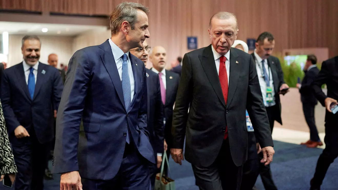 Greek Prime Minister Kyriakos Mitsotakis and Turkish President Tayyip Erdogan meet on the sidelines of NATO Summit, in Washington, United States, July 10, 2024. Dimitris Papamitsos/Greek Prime Minister's Office