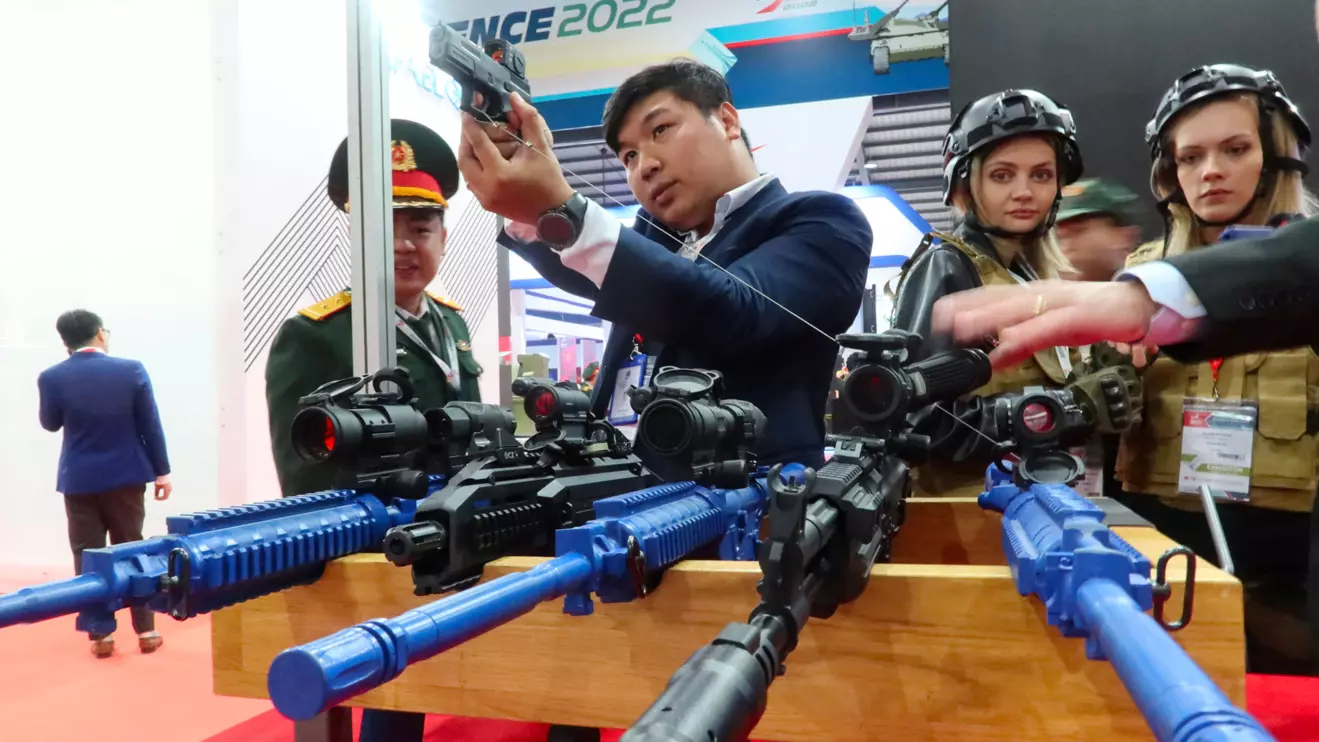 People look at weapons kept on display at the Vietnam International Defence Expo 2022, in Hanoi, Vietnam, Reuters/Minh Nguyen