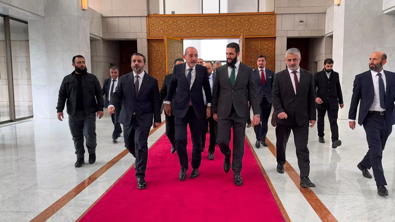 Jordan's Foreign Minister Ayman Safadi meets with Syria's de facto new ruler Ahmed al-Sharaa in Damascus, Syria in this handout released December 23, 2024. Jordanian Foreign Ministry