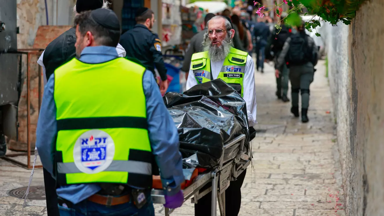 The body of an attacker who, according to the Israeli police, is a Turkish citizen, is transported, as Israeli emergency personnel respond to a stabbing attack, in Jerusalem April 30, 2024Reuters/Ammar Awad