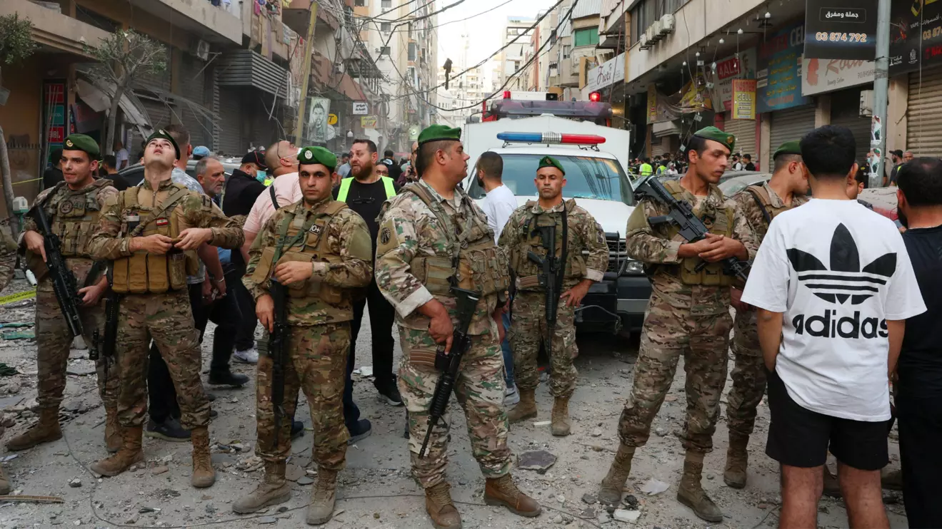 Members of the Lebanese army secure the area near the site of an Israeli strike, after Israeli military said on Sunday that it struck a militant from the Lebanese Iran-aligned Hezbollah group, in Beirut's southern suburbs, Lebanon November 23, 2025. Reuters/Mohamed Azaki