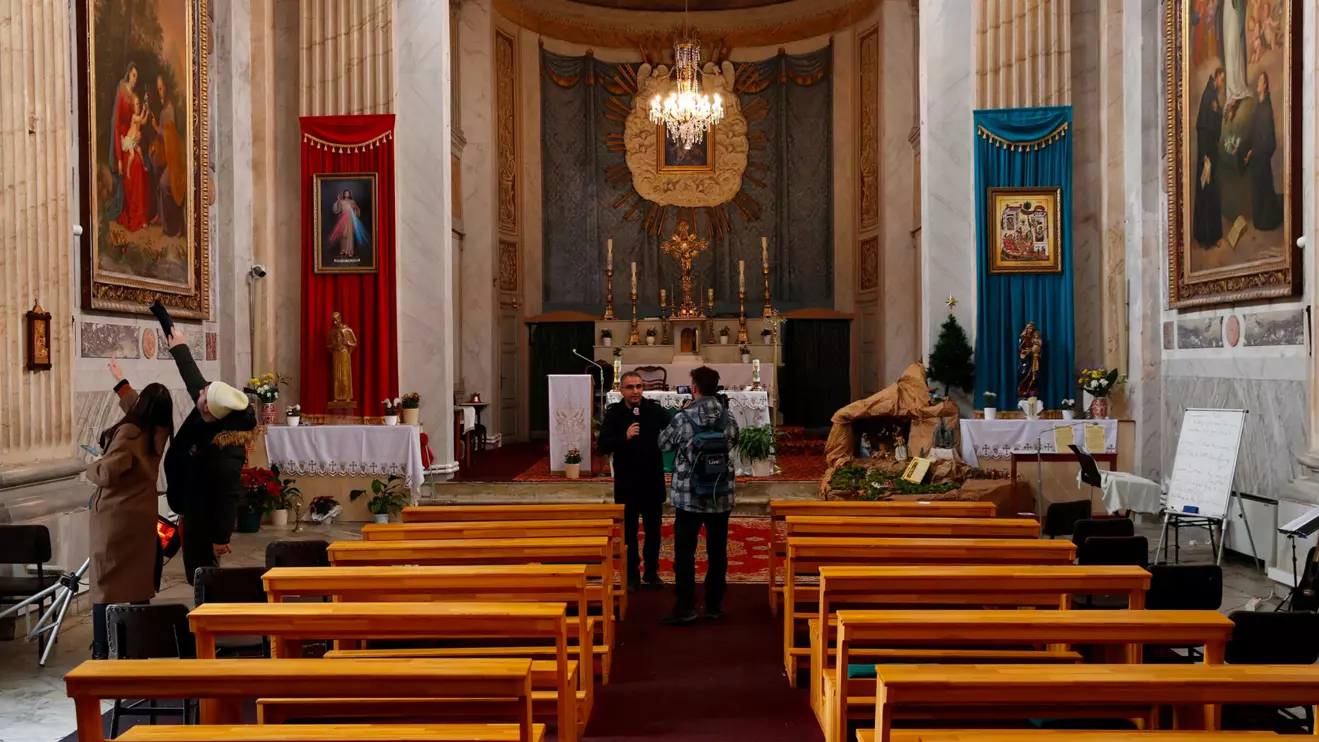 Media members visit Italian Santa Maria Catholic Church a day after an attack killing one during the Sunday service, in Istanbul, Turkey January 29, 2024. Reuters/Dilara Senkaya