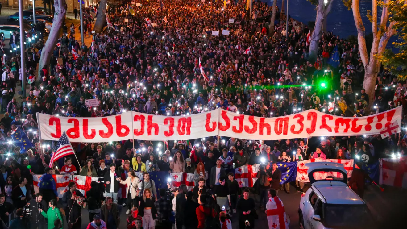 Demonstrators take part in a procession to protest against a bill on "foreign agents" and to support Georgia's membership in the European Union, in Tbilisi, Georgia, May 24, 2024, Reuters/Irakli Gedenidze
