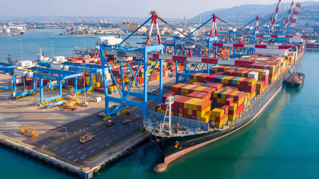 Haifa Commercial Port with Container Ships and transtainer yard © Mena Today 