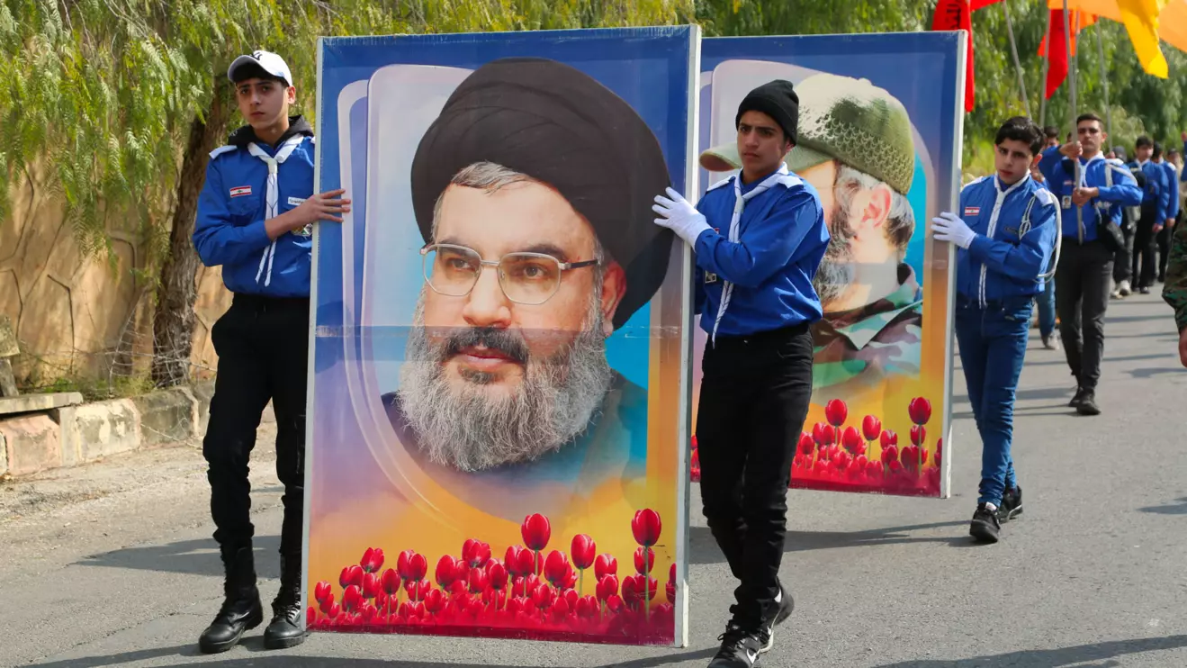 Hezbollah scouts parade with a portrait of Hassan Nasrallah © Mena Today/File Photo 