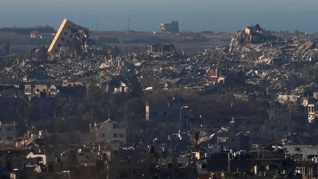 Buildings lie in ruin inside the Gaza Strip, amid the ongoing conflict between Israel and Hamas, as seen from southern Israel, January 1, 2025. Reuters/Kai Pfaffenbach