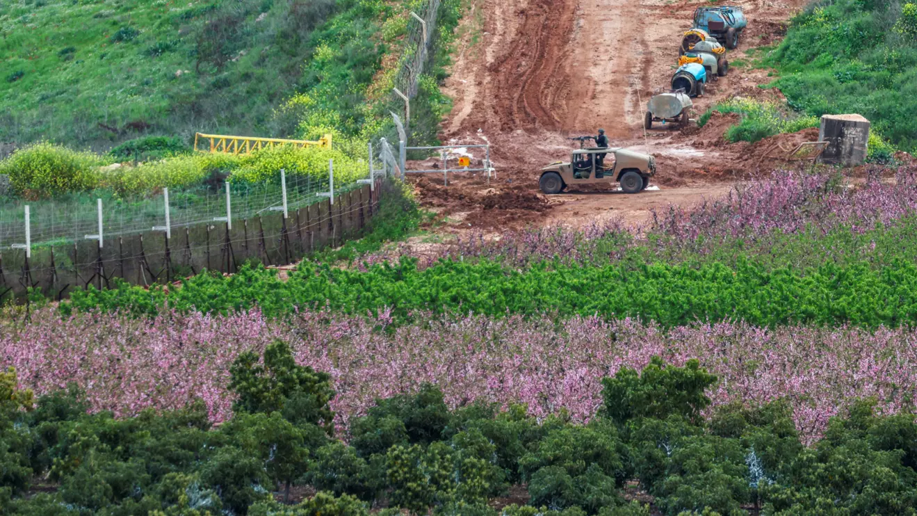 An Israeli military jeep drives to the border with Lebanon, amid escalating hostilities between Israel and Hezbollah, as the U.S.-Israeli conflict with Iran continues, in northern Israel, March 25, 2026. Reuters/Tyrone Siu