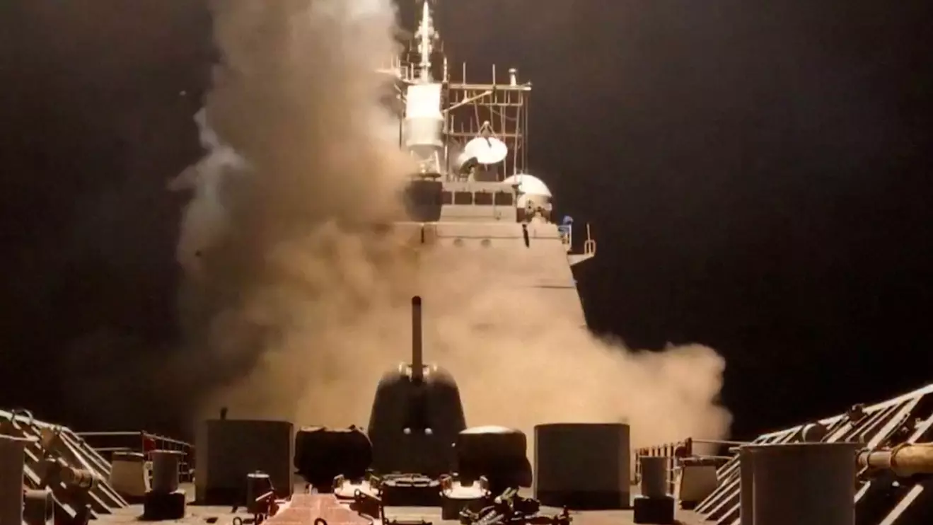 A ship fires missiles at an undisclosed location, after U.S. President Donald Trump launched military strikes against Yemen's Iran-aligned Houthis on Saturday over the group's attacks against Red Sea shipping, in this screengrab obtained from a handout video released on March 15, 2025. U.S. Central Command/Handout via Reuters