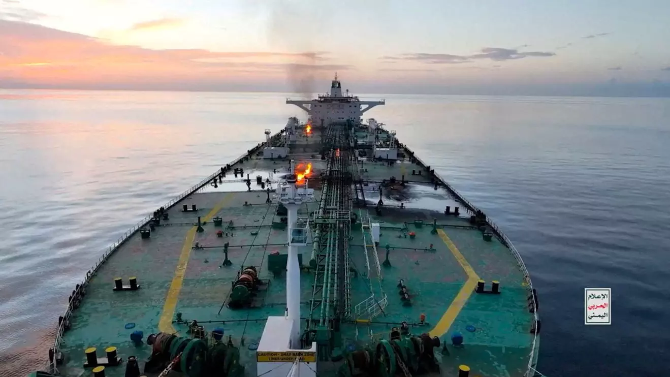 Smoke rises after an explosion on a ship that Houthis say is an attack by them on Greek-owned MV Tutor in the Red Sea, dated June 12, 2024, in this screen grab obtained from a video. HOUTHI MEDIA CENTRE/Handout via Reuters