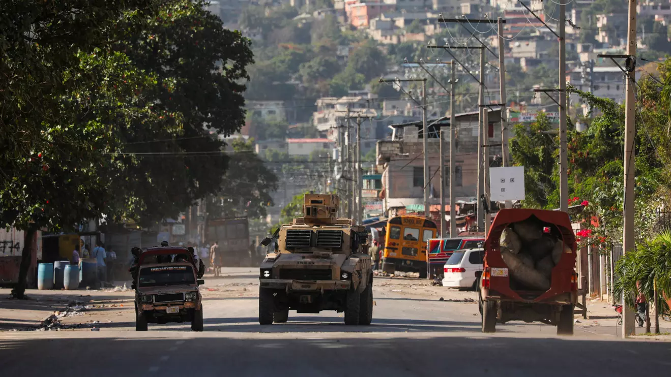 An armed vehicle is seen near the National Penitentiary following violent clashes in the capital that have damaged communications and led to a prison escape from this main penitentiary in Port-au-Prince, Haiti March 3, 2024. Reuters/Ralph Tedy Erol