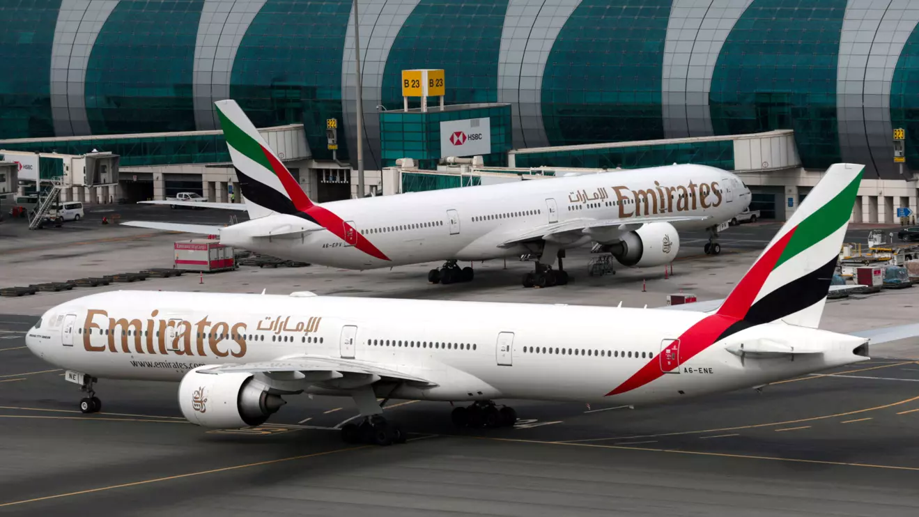 Emirates Airline Boeing 777-300ER planes are seen at Dubai International Airport in the United Arab Emirates February, REUTERS/Christopher Pike