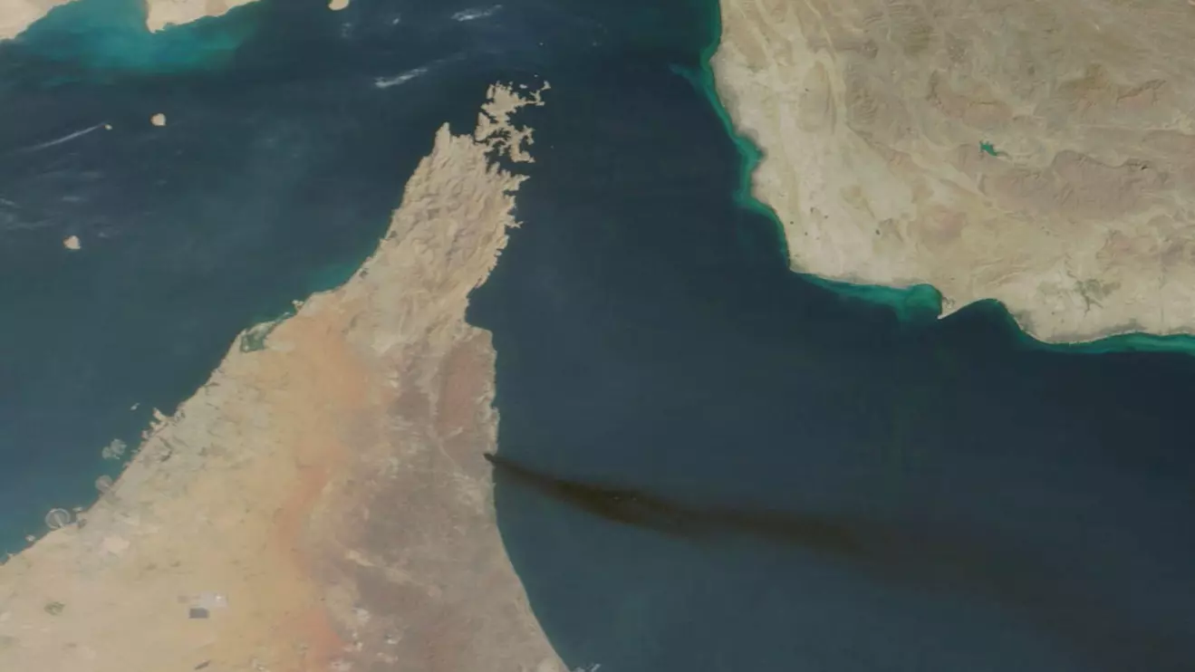 Satellite image shows smoke rising from UAE's Fujairah port, amid the U.S.-Israeli conflict with Iran, in Fujairah, United Arab Emirates, March 15, 2026. Nasa Worldview/Handout via Reuters