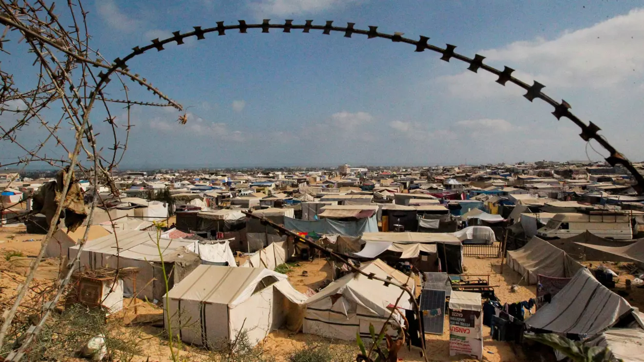 isplaced Palestinians, who fled their houses due to Israeli strikes, shelter at a tent camp, amid the ongoing conflict between Israel and Hamas, in Rafah in the southern Gaza Strip, June 19, 2024. Reuters/Hatem Khaled
