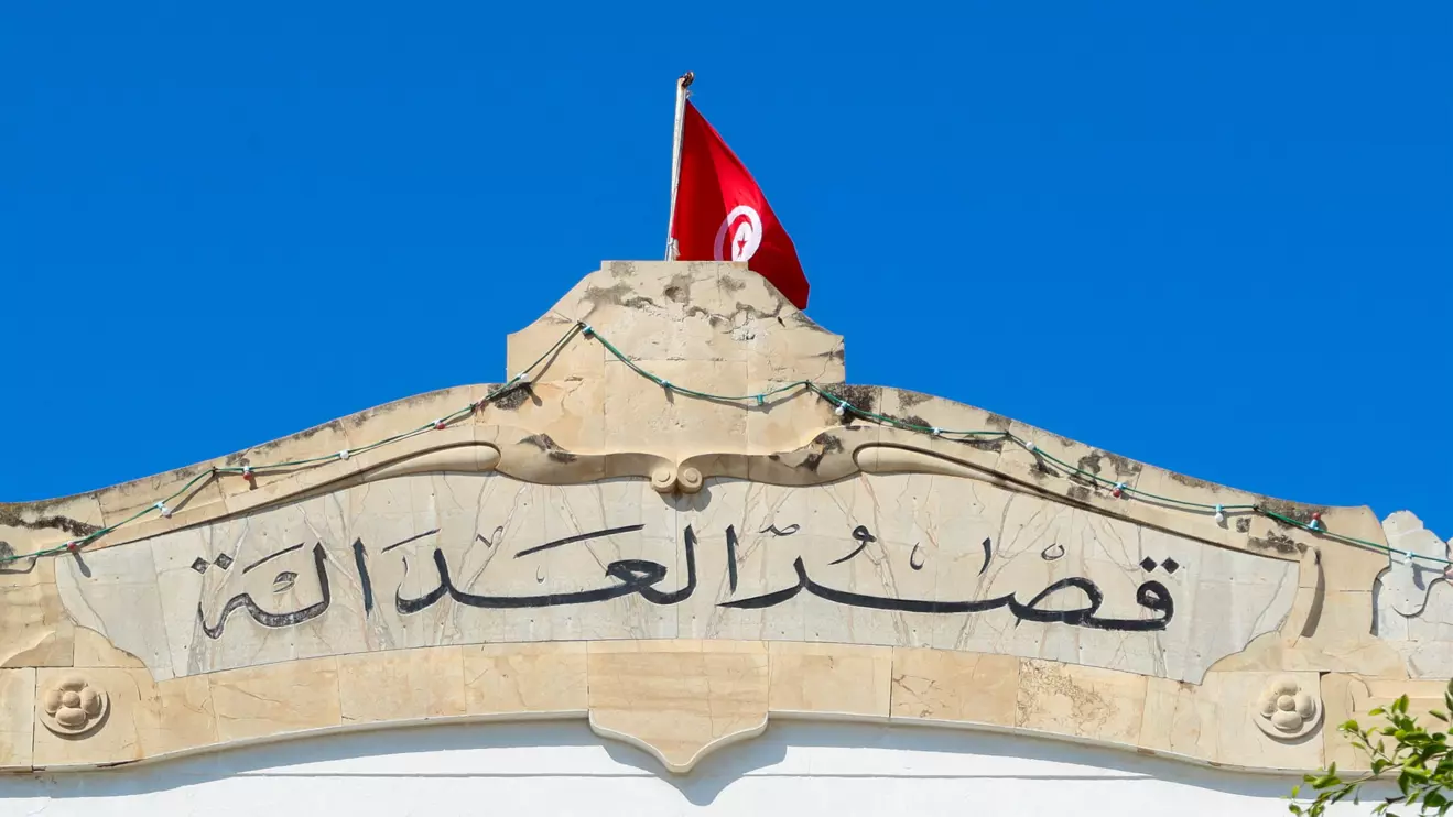 A Tunisian flag flutters atop of the Palace of Justice building in Tunis, Reuters/Jihed Abidellaoui
