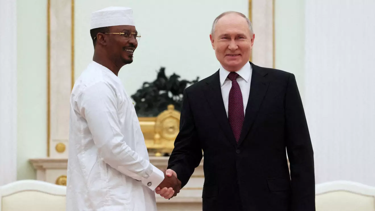 Russia's President Vladimir Putin shakes hands with Chad's interim President Mahamat Idriss Deby during a meeting at the Kremlin in Moscow, January 24, 2024. Sputnik/Mikhail Metzel/Pool via Reuters 
