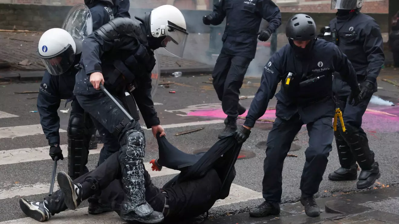 Police detain a demonstrator as student protesters join a nationwide strike against the Belgian government's austerity measures and budget cuts, in Brussels, Belgium, October 9, 2026. Reuters/Yves Herman