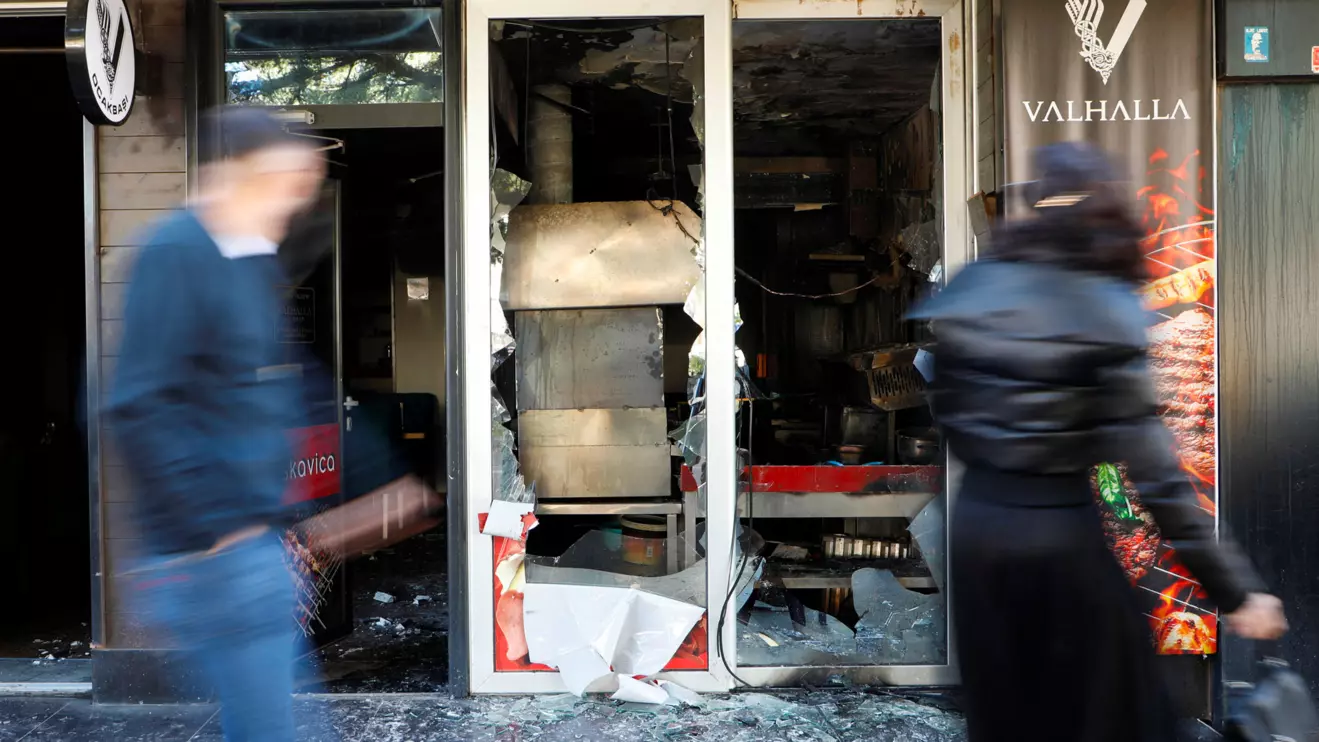 People walk past a demolished Turkish owned restaurant in downtown, after a man was stabbed and wounded in a late-night incident in Podgorica, Montenegro, October 27, 2025. Reuters/Stevo Vasiljevic