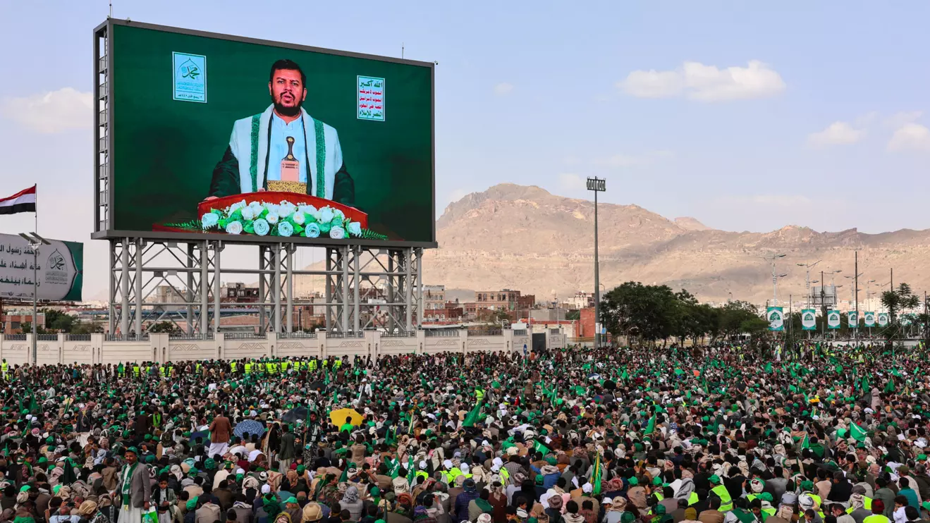 Abdul-Malik al-Houthi appears on a screen as people, mainly Houthi supporters, gather to mark the Prophet Muhammad's birthday, at Sabeen Square in central Sanaa, Yemen September 4, 2025. Reuters/Khaled Abdullah