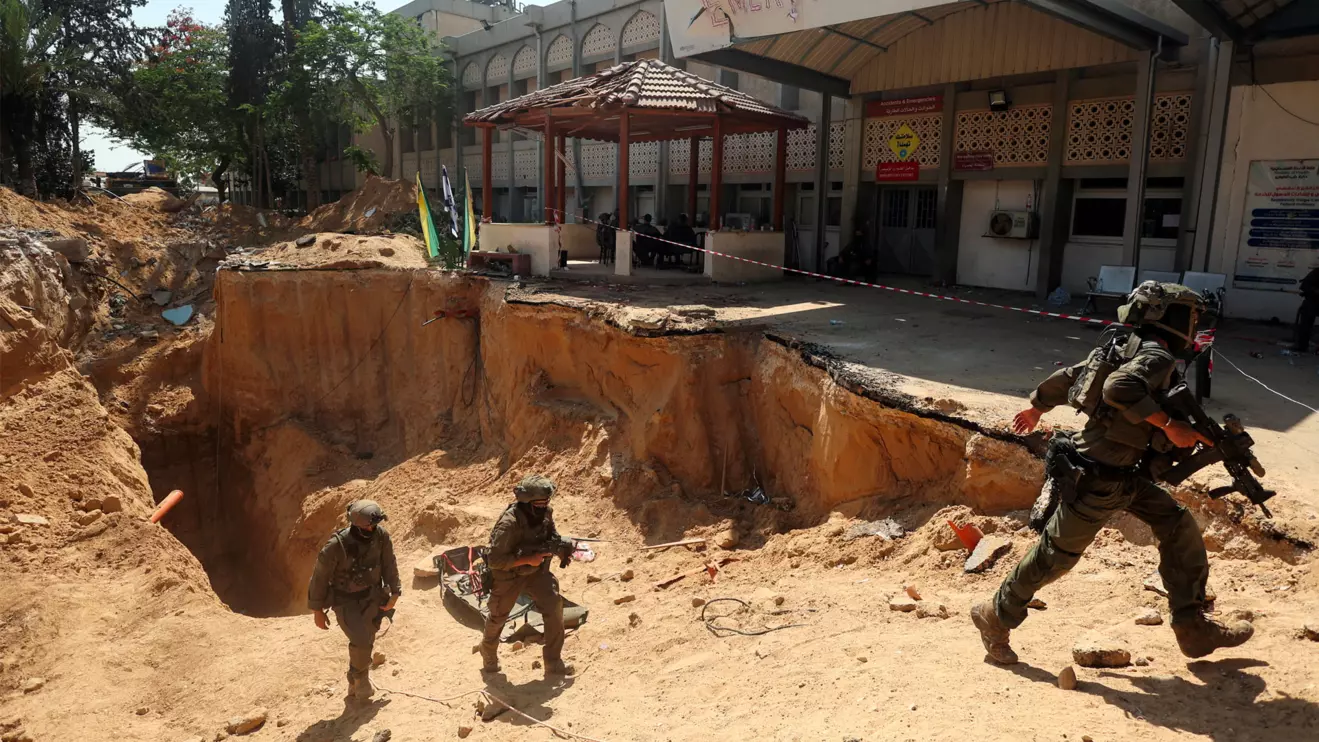 Israeli soldiers walk out from a tunnel underneath the European Hospital in Khan Younis at the Gaza Strip, amid the ongoing ground operation of the Israeli army against Palestinian Islamist group Hamas, June 8, 2025. Reuters/Ronen Zvulun