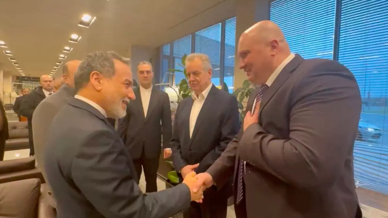 Iran's Foreign Affairs Minister Abbas Araqchi is greeted by officials, according to Iran's media, during his visit to Russia for talks with Russian President Vladimir Putin, in a place given as St. Petersburg, Russia, in this screenshot from a video released on April 27, 2026. Seyed Abbas Araghchi via Telegram