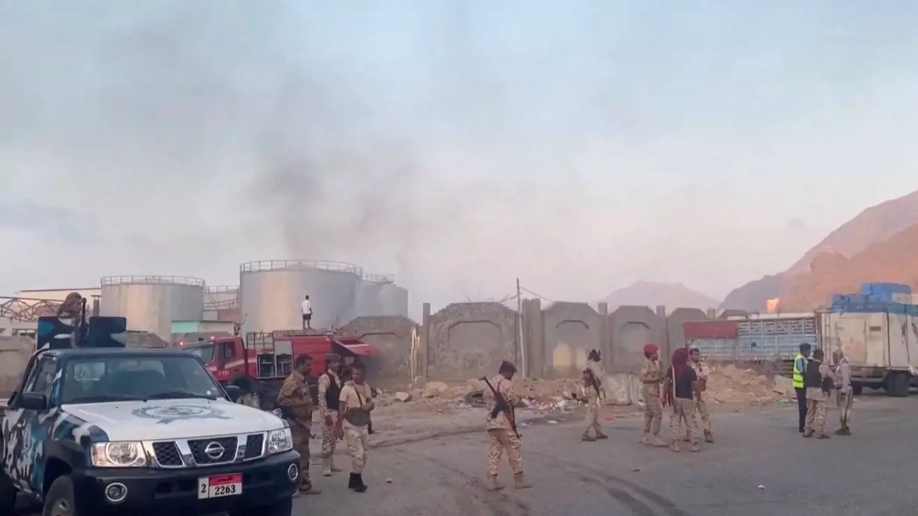 Smoke rises in the aftermath of a Saudi-led coalition airstrike, which targeted what it described as foreign military support to UAE-backed southern separatists, in Yemen's southern port of Mukalla, in this screengrab from a handout video obtained by Reuters on December 30, 2025. SABAA TV