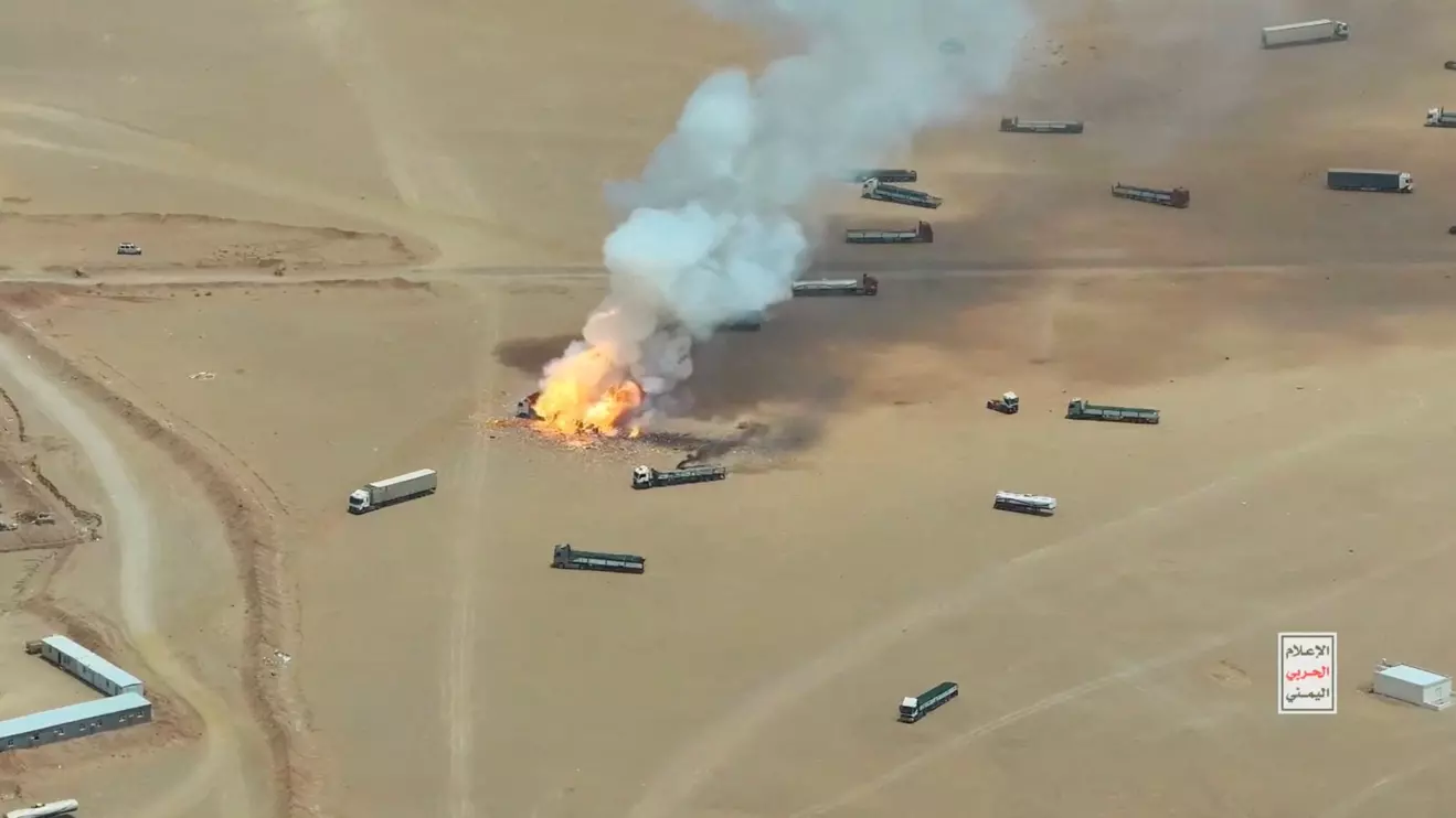 Smoke rises from a burning truck during what the Houthis say was an attack targeting trucks coming from Saudi territory, at Al-Wadiah border crossing near Al-Wadiah, on the Saudi-Yemen border, in this still image obtained from a handout video released September 7, 2026. Houthi Media Centre