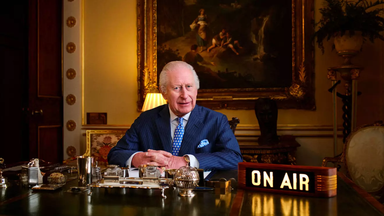 Britain's King Charles poses in his office where "The King's Music Room" recording takes place in Buckingham Palace, London, Britain, in this undated handout photo. The King’s Music Room - Courtesy of Apple Music/Handout via Reuters