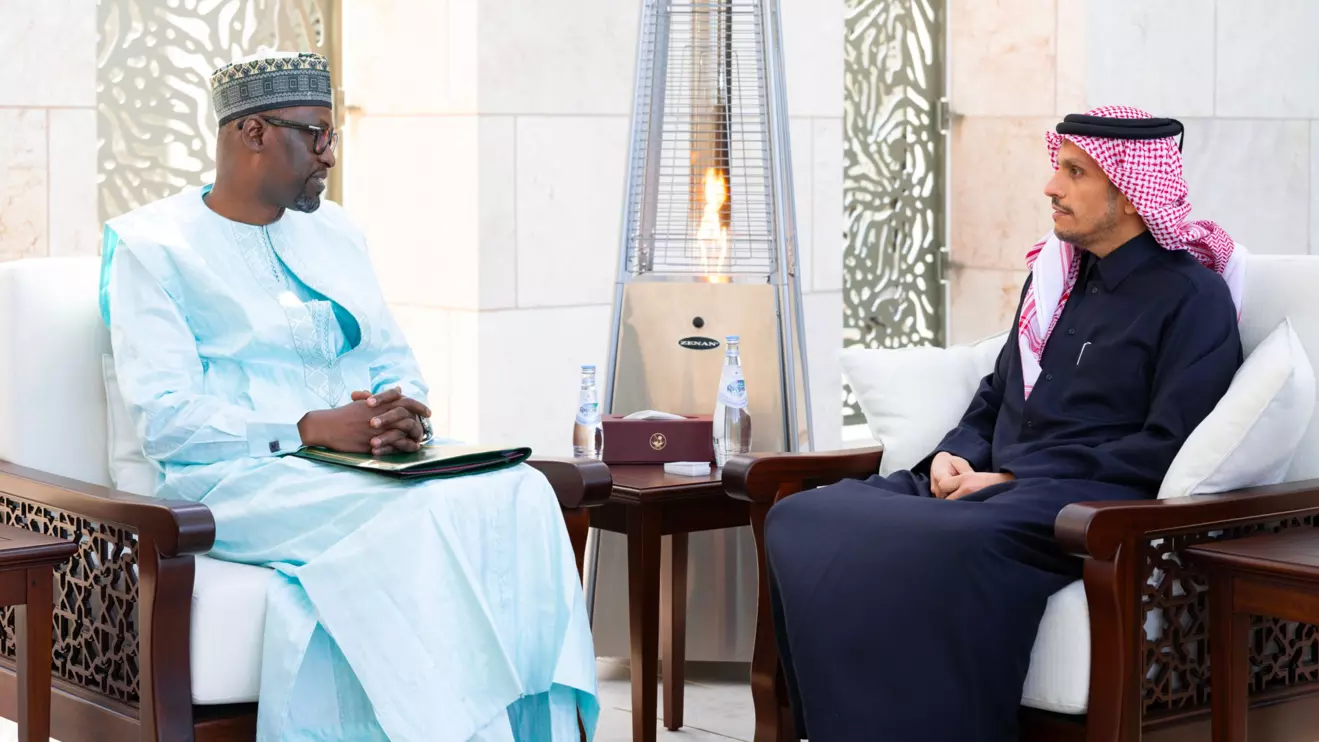 Abdoulaye Diop and Mohammed bin Abdulrahman al-Thani