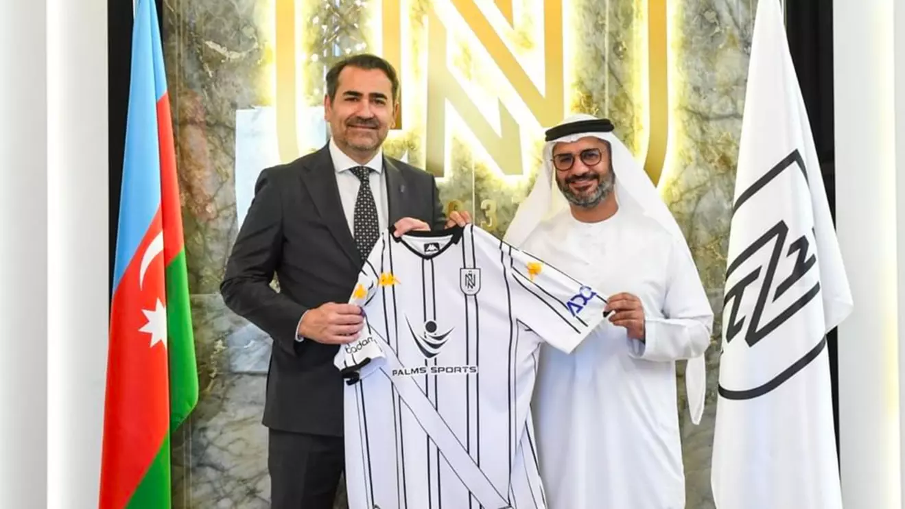 Anas Jawdat Albarguthi, Group Chief Operating Officer at ADQ (R) with the president of  Neftçi PFK © WAM