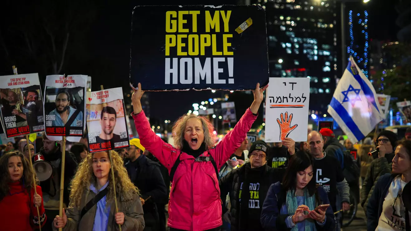 Demonstrators hold signs and pictures of hostages, as relatives and supporters of Israeli hostages kidnapped during the October 7, 2023 attack by Hamas protest demanding the release of all hostages in Tel Aviv, Israel, February 13, 2025. Reuters/Itai Ron