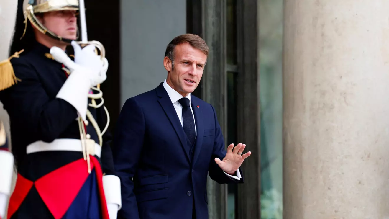 French President Emmanuel Macron waves to journalists at the Elysee Palace in Paris, France, September 16, 2025. Reuters/Benoit Tessier