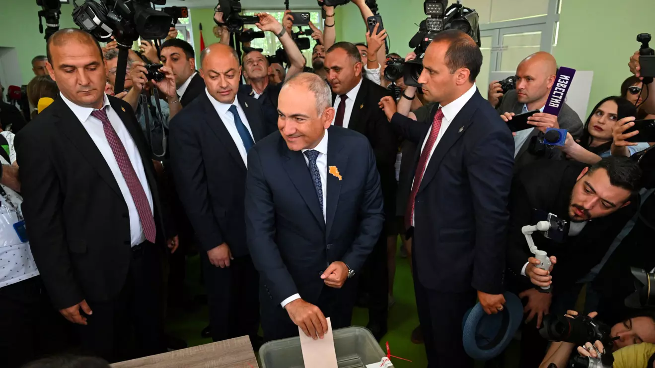 Armenian Prime Minister and leader of the Civil Contract party Nikol Pashinyan casts a ballot at a polling station during a parliamentary election in Yerevan, Armenia, June 7, 2026. Stringer/Photolure via Reuters