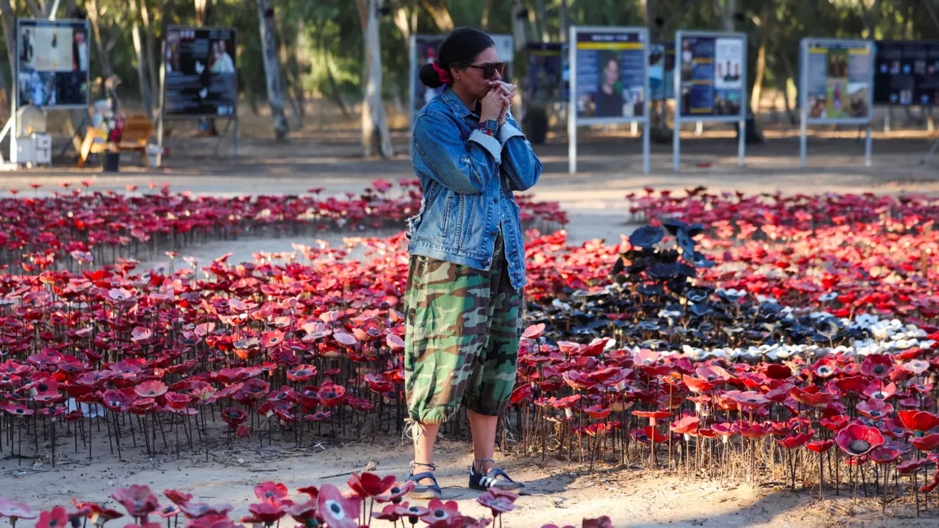 A woman reacts as she visits the site of the Nova music festival, where partygoers were killed and kidnapped during the deadly Hamas-led October 7, 2023 attack, on the third anniversary of the attack, near Reim, southern Israel, October 7, 2026. Reuters/Ronen Zvulun