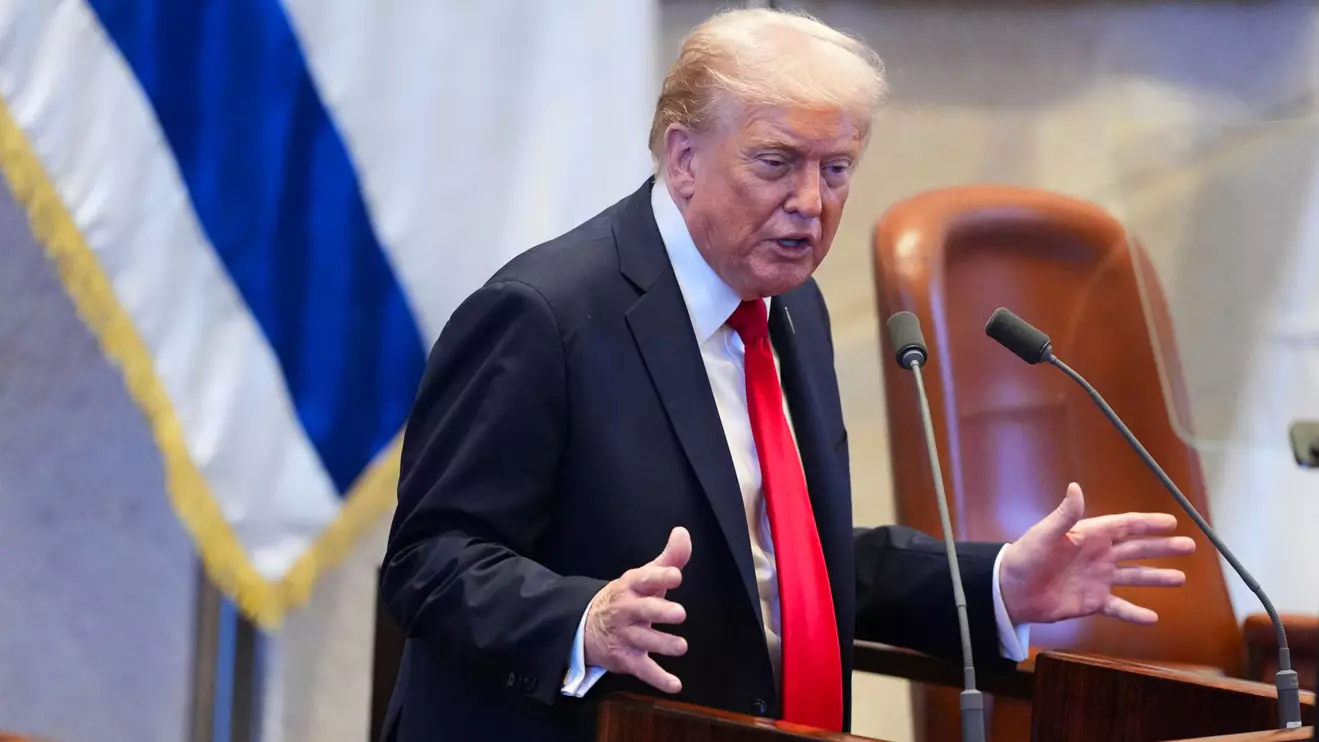 President Donald Trump speaks to the Knesset, Israel's parliament, Monday, Oct. 13, 2025, in Jerusalem. Evan Vucci/Reuters