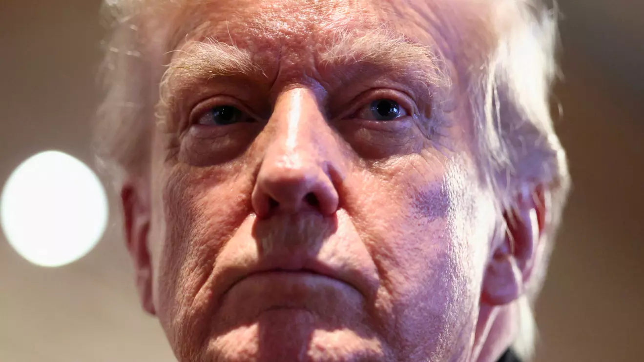 U.S. President Donald Trump looks on as he visits Machine Shed restaurant in Urbandale, Iowa, U.S., January 27, 2026. Reuters/Kevin Lamarque