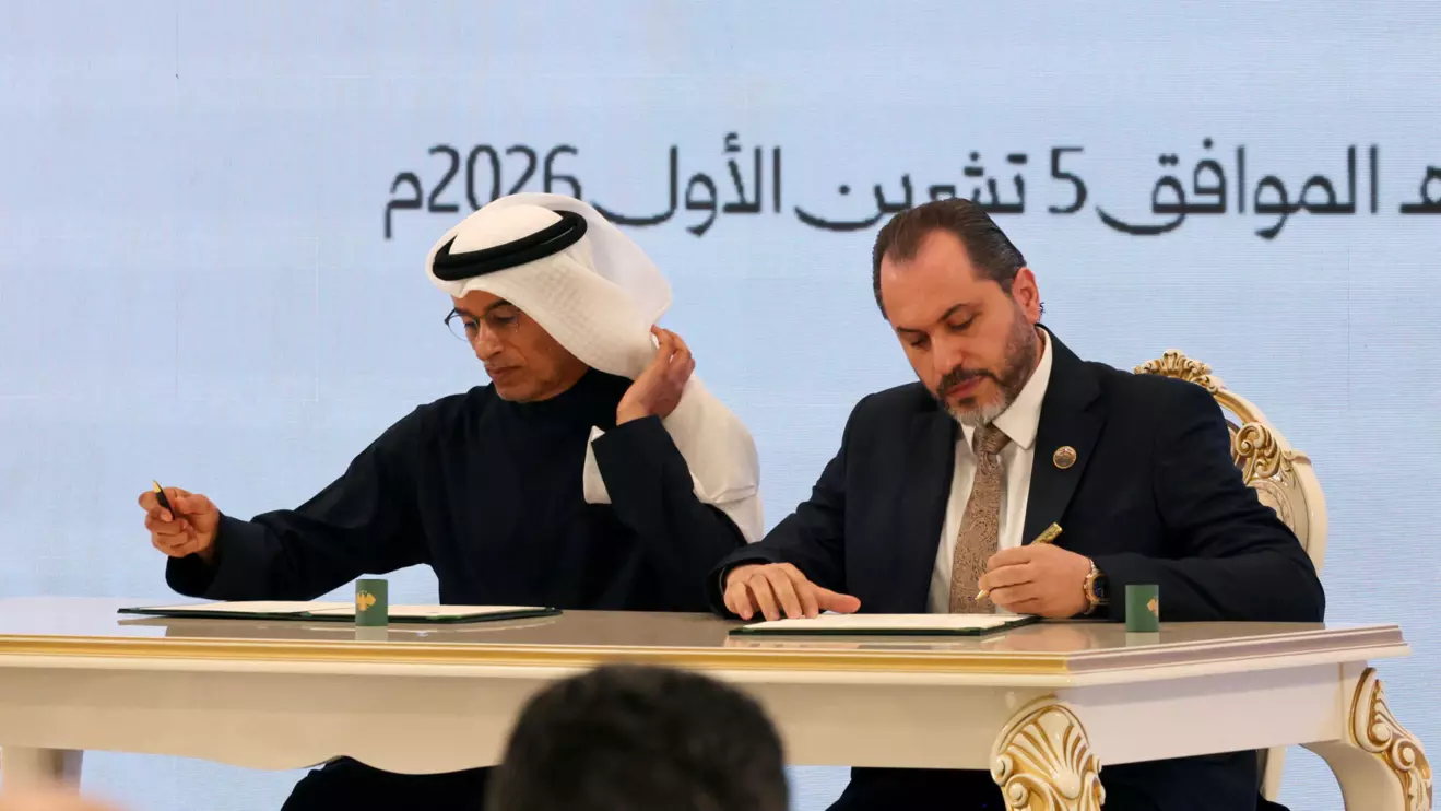 Chairperson of UAE-based real estate developer Eagle Hills, Mohamed Alabbar, and Syrian Minister of Tourism Mazen al-Salhani attend the signing of an economic agreement between the Syrian government and Eagle Hills, at the People's Palace in Damascus, Syria, October 5, 2026. Reuters/Khalil Ashawi