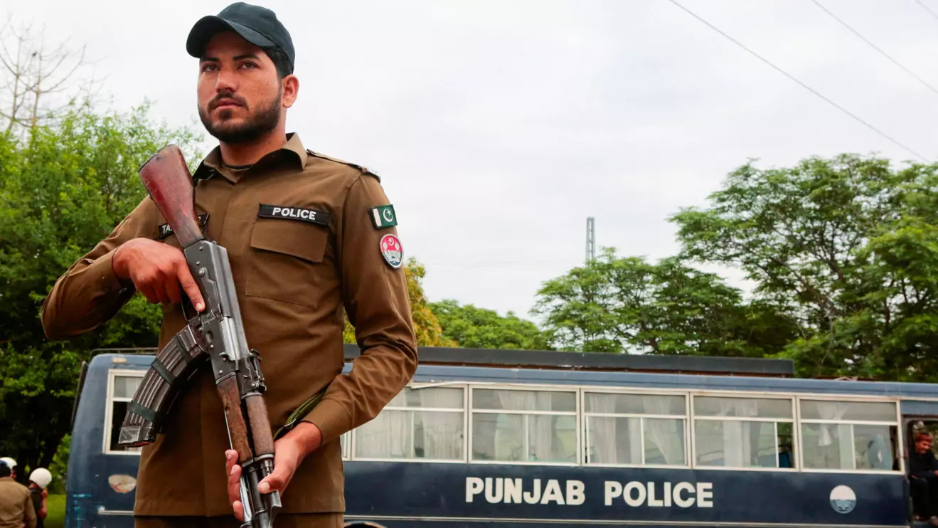 A police officer stands guard on a road leading to Serena Hotel as delegations from the United States and Iran are expected to hold high-stakes talks in Islamabad, Pakistan, April 11, 2026. Reuters/Asim Hafeez DAY