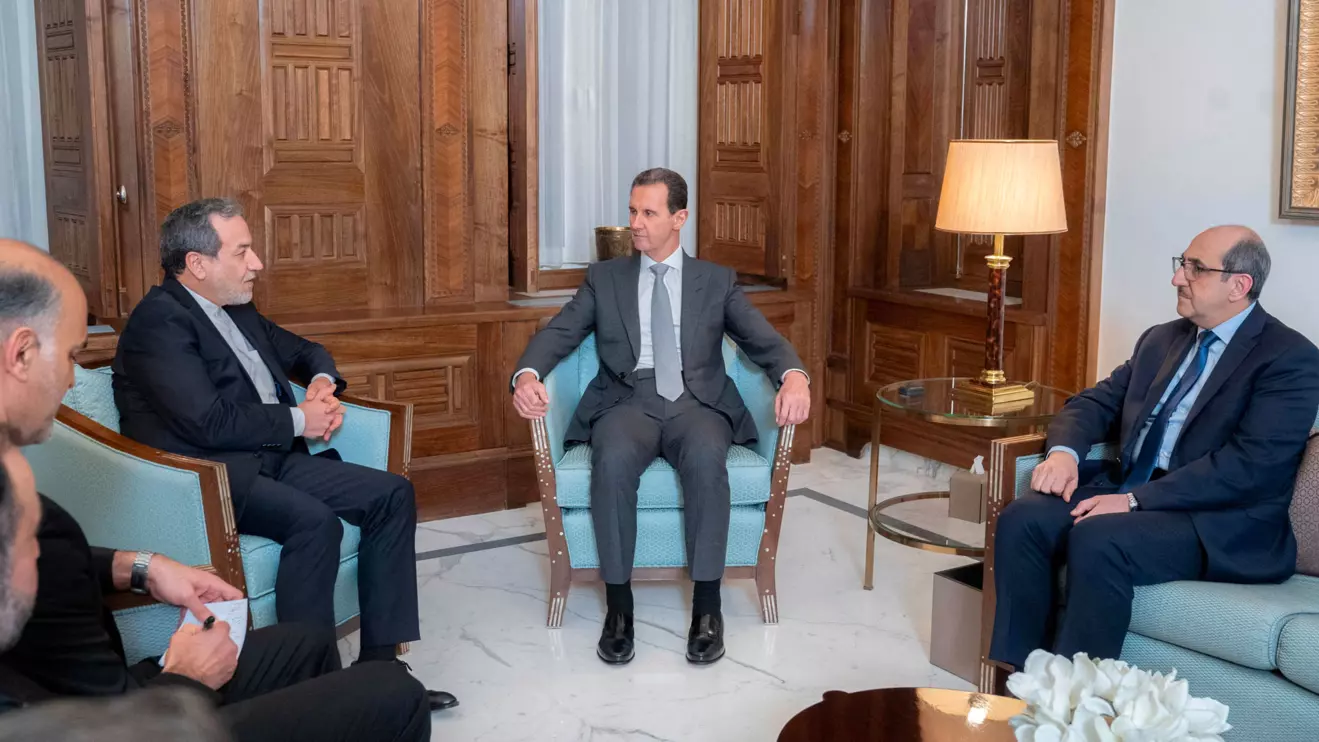 Syria's President Bashar al-Assad meets with Iran's Foreign Minister Abbas Araghchi, in Damascus, Syria, December 1, 2024. SANA