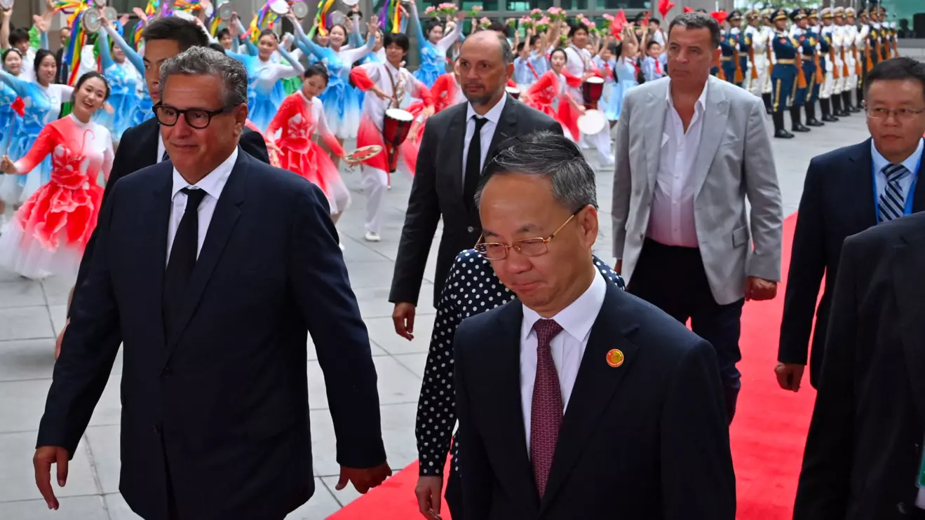 Moroccan Prime Minister Aziz Akhannouch arrives at the Beijing Capital International airport ahead of the Forum on China-Africa Cooperation (FOCAC) summit in Beijing on September 4, 2024. ADEK BERRY/Pool via Reuters