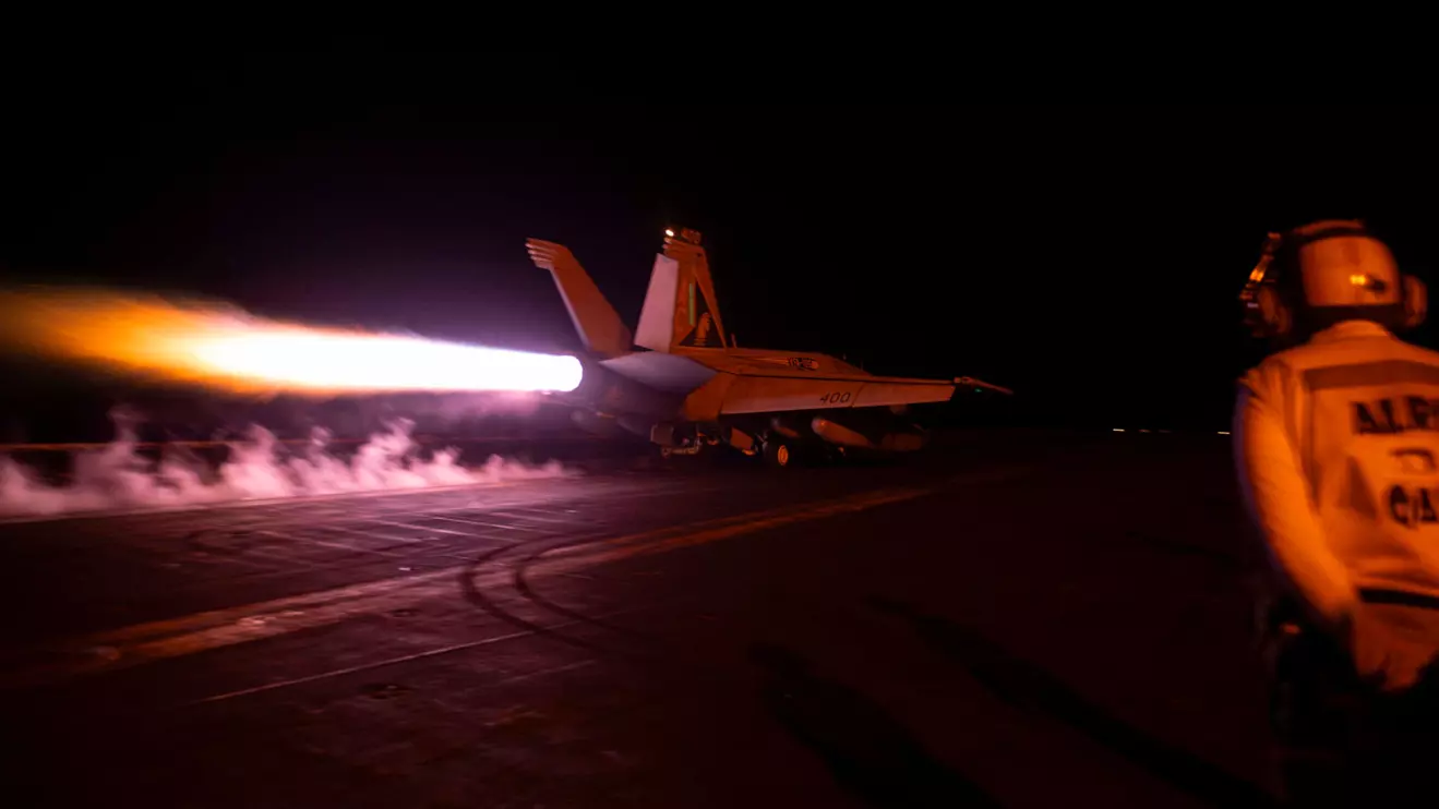 A fighter jet is launched from the U.S. Navy aircraft carrier USS Dwight D. Eisenhower during a strike against what the U.S. military describe as Houthi military targets in Yemen, February 3, 2024. U.S. Navy/Mass Communication Specialist 3rd Class Janae Chambers/Handout via Reuters