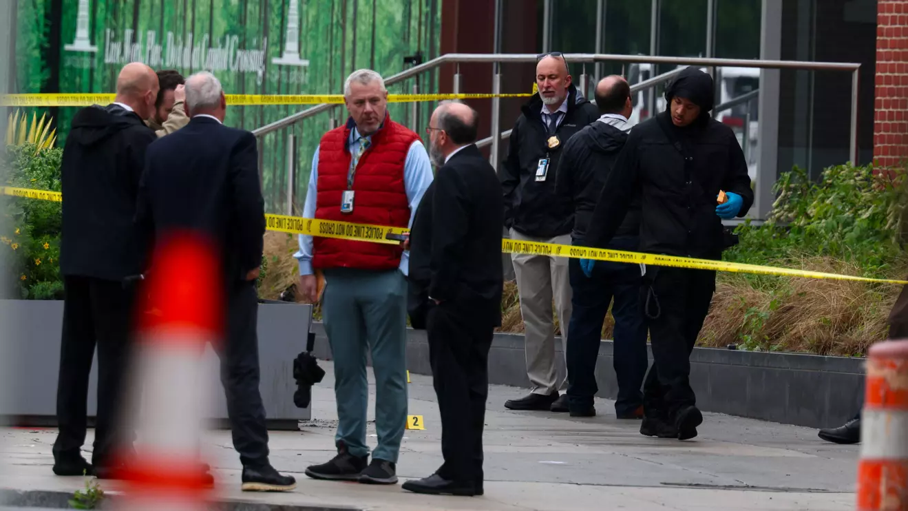 A technician stands in a forensic evidence crime scene van near the place where, according to the U.S. Homeland Security Secretary, two Israeli embassy staff were shot dead near the Capital Jewish Museum in Washington, D.C., U.S. May 22, 2025. Reuters/Evelyn Hockstein