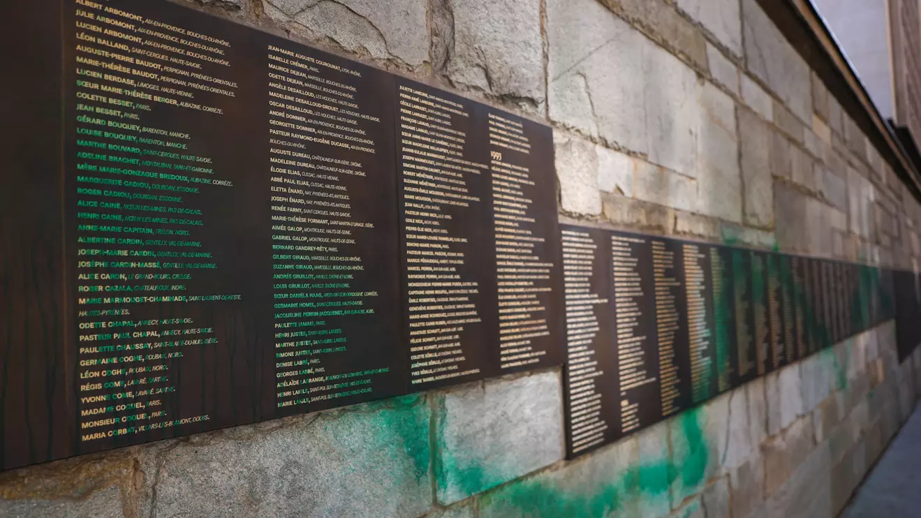 A gerneral view of 'The Wall of the Righteous' which honours people who saved Jews during the Nazi occupation of France, after it was covered in green paint, in Paris, France, May 31, 2025. Reuters/Abdul Saboor