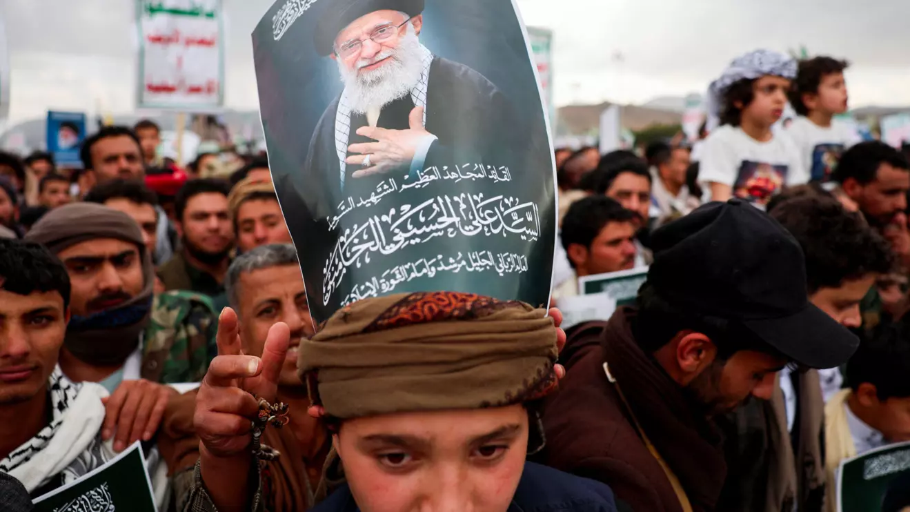 A protester with a poster on his head featuring a picture of late Iran's Supreme Leader Ayatollah Ali Khamenei joins a demonstration with Houthi supporters in solidarity with Iran and Lebanon, amid the U.S.-Israeli conflict with Iran, in Sanaa, Yemen March 6, 2026. Reuters/Khaled Abdullah