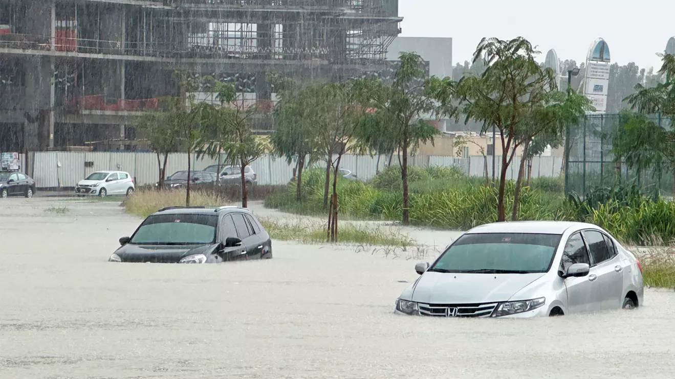 Cars drive through a flooded street during a rain storm in Dubai, United Arab Emirates, April 16, 2024. Reuters/Abdel Hadi Ramahi