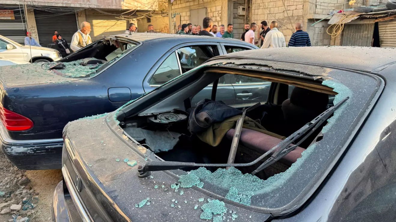Damaged cars stand inside the Ain al-Hilweh Palestinian refugee camp, near the site of the Israeli strike that killed several people yesterday night, according to the Lebanese Health Ministry, in the southern city of Sidon, Lebanon November 19, 2025. Reuters/Ali Hankir