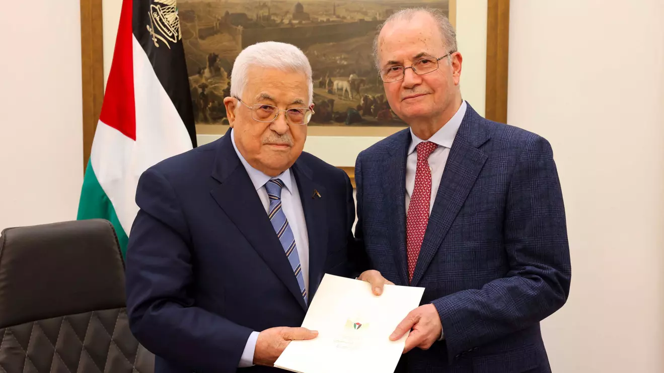 Palestinian President Mahmoud Abbas appoints Mohammad Mustafa as prime minister of the Palestinian Authority (PA), in Ramallah, in the Israeli-occupied West Bank March 14, 2024 in this handout image. Palestinian president office/Handout via Reuters