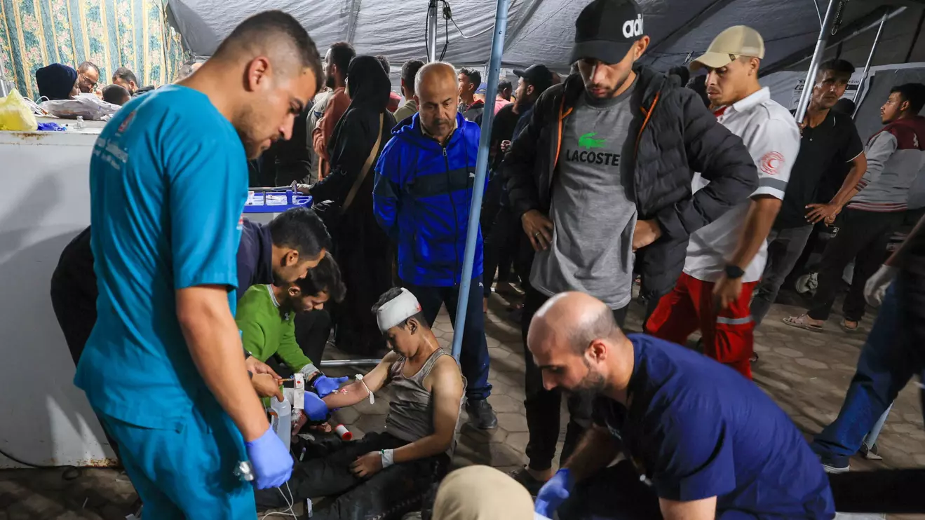 An injured Palestinian receives treatment following an Israeli air strike, according to medics, at Al-Ahli Arab Hospital in Gaza City November 19, 2025. Reuters/Dawoud Abu Alkas