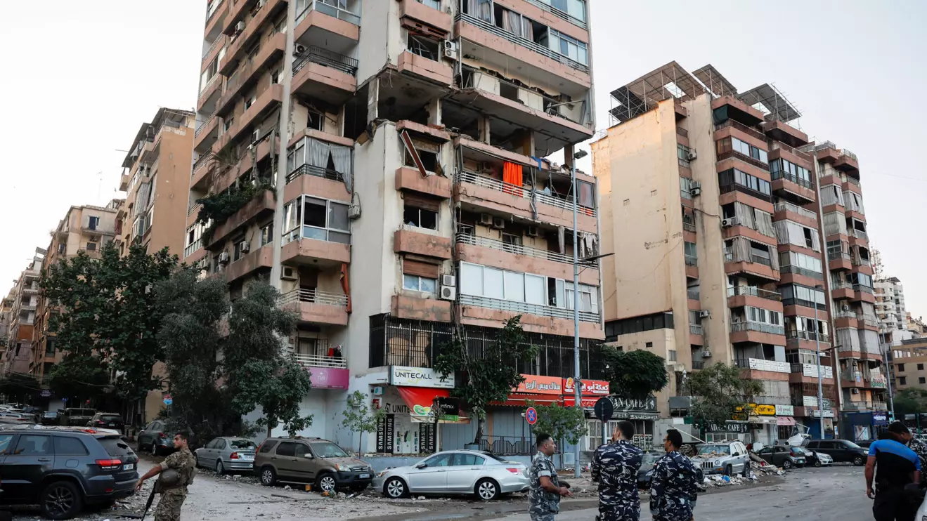 Police officers work at the site of an Israeli strike, amid ongoing cross-border hostilities between Hezbollah and Israeli forces, in Kola, central Beirut, Lebanon September 30, 2024. Reuters/Louisa Gouliamaki